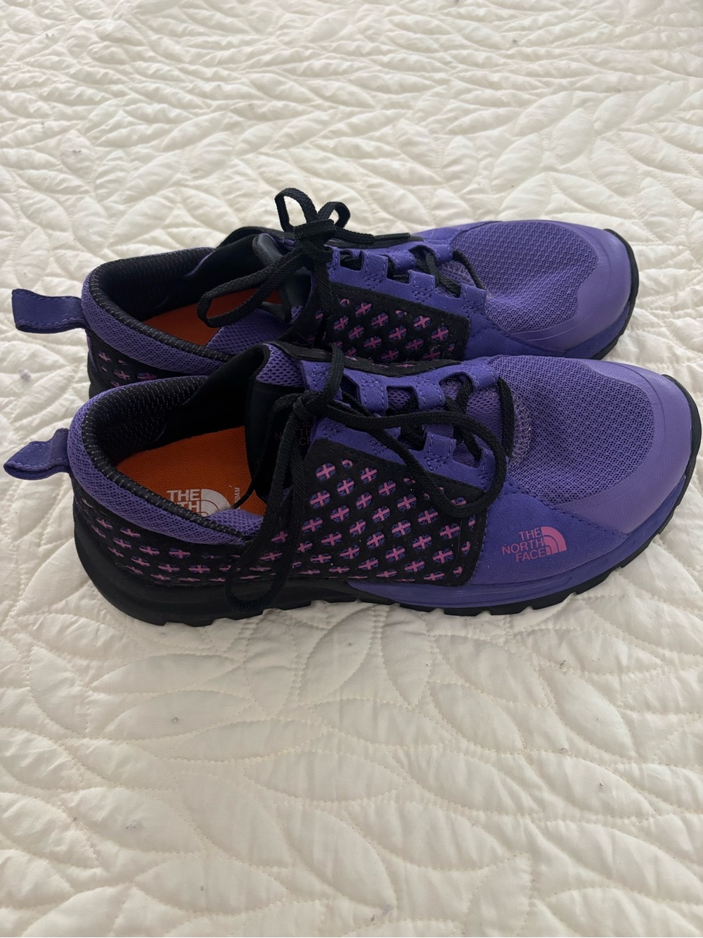 The North Face Purple and Black Trail Sneaker. 10